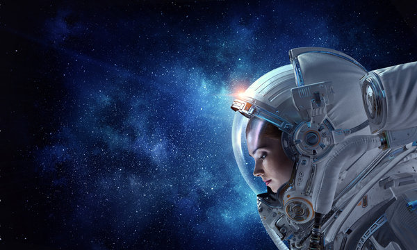 Attractive woman in spacesuit