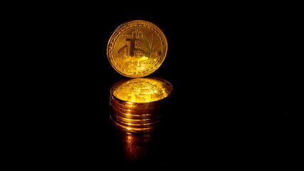 Gold crypto coin bitcoin on a black background (2)