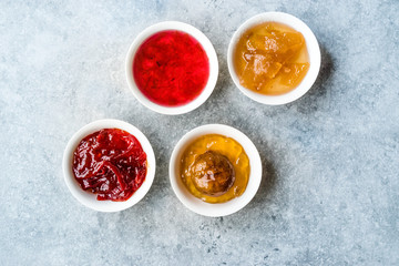 Assorted Variety of Jams and Marmalades;  Rose, Red Pepper, Mandarin and Citron Peel in Small Bowl.