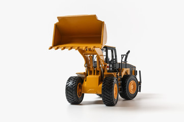 Obraz na płótnie Canvas Wheel loader model on white background with yellow bucket lift up