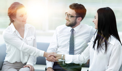 Fototapeta premium handshake of manager and client in the office lobby