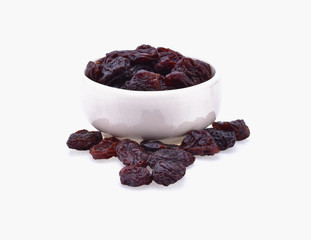 raisins in a bowl isolated on white background