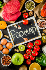 Healthy diet food. Various low fodmap ingredients selection - meat, vegetables, berry, fruit, grains, Trendy healthy lifestyle concept. On dark rusty background copy space top view