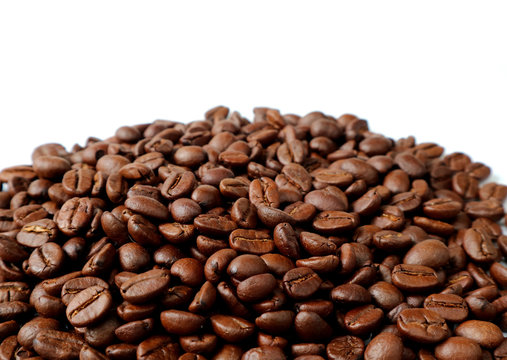 Pile of Roasted Coffee Beans with Free Space for Text and Design 