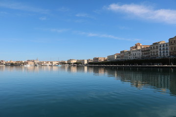 Fototapeta na wymiar Port and Foro Vittorio Emanuele II in Ortigia Syracuse, Sicily Italy 