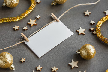 White empty card on Christmas background with wooden stars