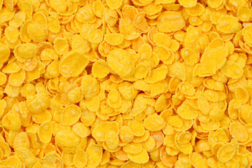 Corn-flakes background and texture. Top view. cornflake cereal box for morning breakfast.