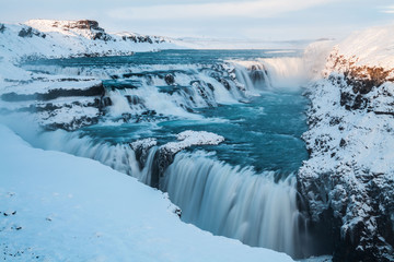Gullfoss waterfall view in the canyon of the Hvita river during winter snow Iceland