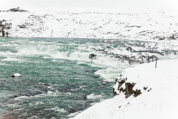 Urridafoss waterfall view during winter which located in the river Pjorsa in southwest Iceland