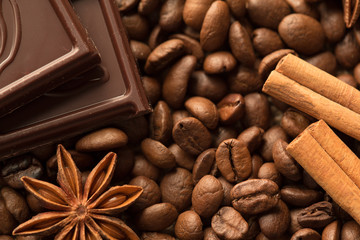 Chocolate and coffee background, close-up of a beans