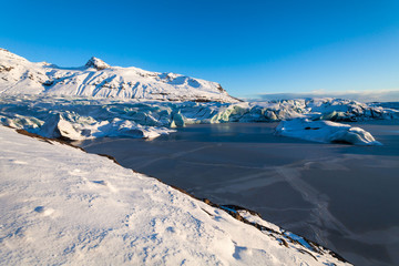 Svinafellsjokull glacier view during winter snow in Iceland