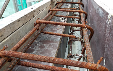 Reinforcement bar tied together using tiny wire and place on top or inside the plywood form work...