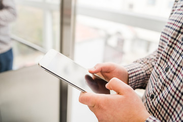 man using digital tablet