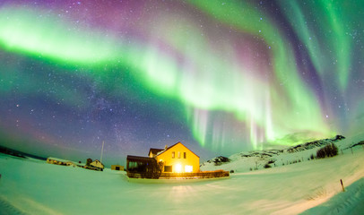 Aurora Borealis or better known as The Northern Lights for background view in Iceland,...