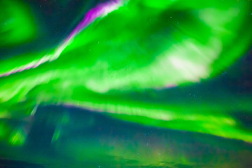 Aurora Borealis or better known as The Northern Lights for background view in Iceland, Snaefellsnesvegur during winter