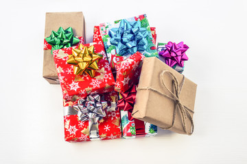 Heap of christmas gifts on white background