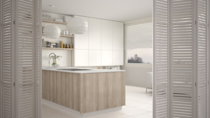White folding door opening on modern luxury contemporary minimalistic white and wooden kitchen, interior design, architect designer concept, blur background