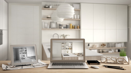 Architect designer desktop concept, laptop and tablet on wooden work desk with screen showing interior design project and CAD sketch, blurred draft in the background, modern kitchen idea template