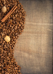 coffee beans and spices on wood