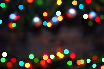 Christmas bokeh circle lights over dark background