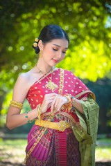 Asia woman in Thai dress traditional-Noppamas Queen Contest in Loy Kratong