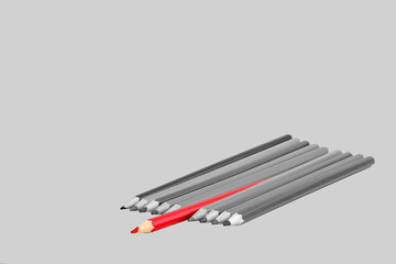 Black and white photo of pencils with red pencil. Concept of individuality