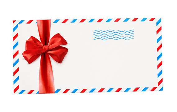 Empty envelope with red and blue borders and stamp tied with ribbon bow