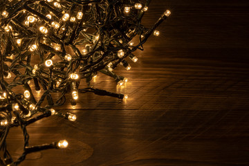 Christmas lights on a wooden table