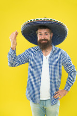 Celebrate traditional mexican holiday. Lets have fun. Mexican guy happy festive outfit ready to...