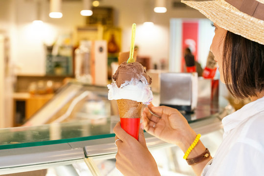 Woman Buy Ice Cream At Grocery Store Freezer