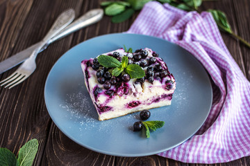 Delicious homemade cottage cheese casserole with berries on a plate