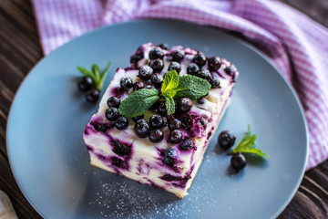 Delicious homemade cottage cheese casserole with berries on a plate