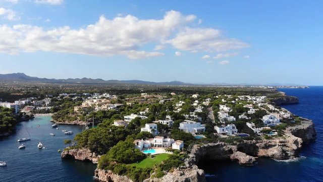 Flight over the bay of Cala D'or and Cala Ferrera in Mallorca