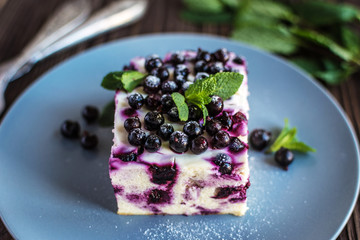 Delicious homemade cottage cheese casserole with berries on a plate