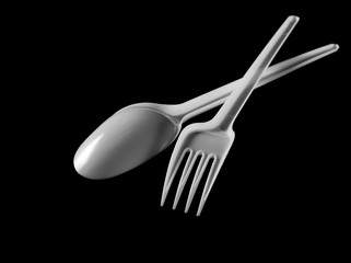 plastic white fork and spoon isolated on black background, clipping path