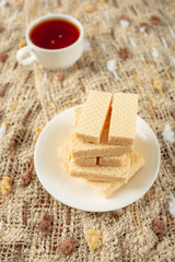 Wafer biscuits served with tea,Vintage filter.