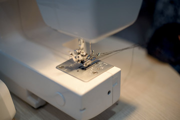 close-up details with sewing machine needle. needlework concept