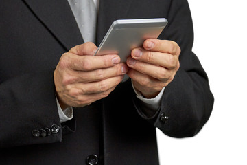 Caucasian entrepreneur holding smartphone close up. Male executive using his smartphone close up, isolated on white background.