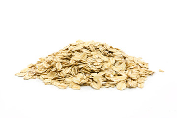 Heap of oatmeal flakes on a white background in close-up