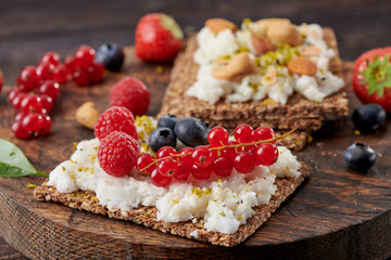Sandwich with nuts and berrie Useful breakfast.