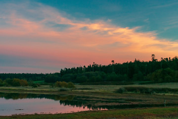 Sunset Reflecting In A Lake On Whidbey Island, Washington