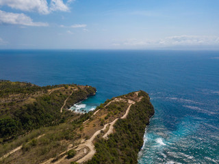 Fototapeta na wymiar Aerial view to ocean cape at Atuh beach on Nusa Penida island, Indonesia