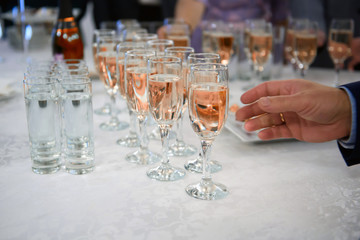 Wine glasses at the party. Alcoholic festive Banquet. 