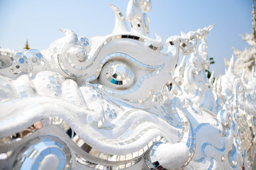 An element of the White Temple / Wat Rong Khun in Chiang Rai, north Thailand. White sculpture in...