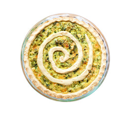 Tart with goat cheese and green onions in glass baking dish