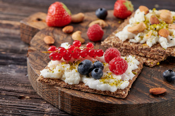 Sandwich with nuts and berrie Useful breakfast.