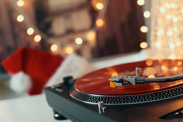 Image of Christmas. Turntable vinyl record player. Sound technology for DJ to mix & play music....