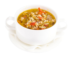 Bowl with rice soup and vegetables isolated on white background