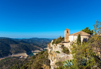 Fototapeta na wymiar View of the Romanesque church of Santa Maria de Siurana, Tarragona, Catalunya, Spain. Copy space for text.