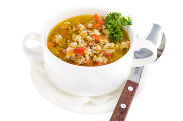 Bowl with rice soup and vegetables isolated on white background